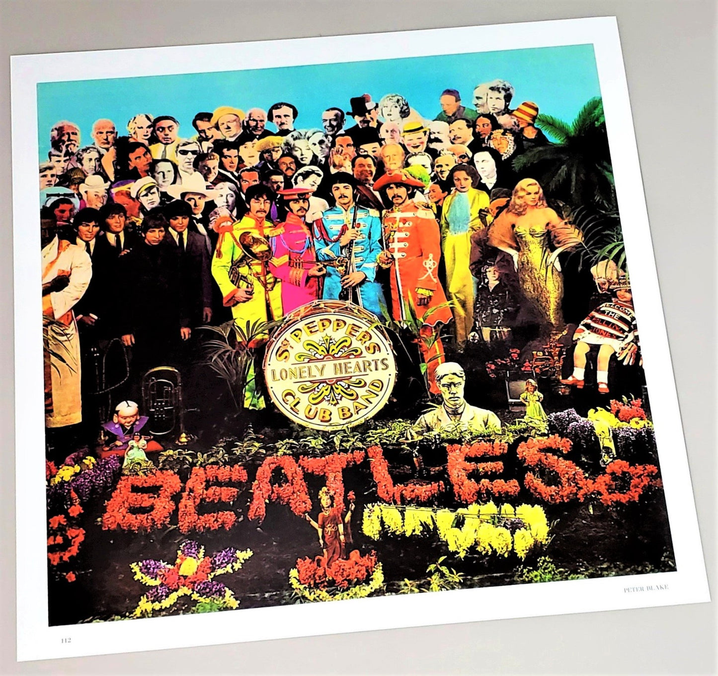 The Beatles 1987 Sgt. Peppers Lonely Hearts Club Band cover art page featured in 2017 Art Record Covers