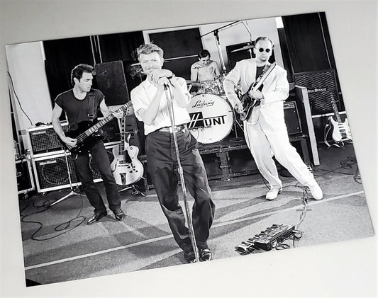 Photograph page of Bowie in 1989 rehearsing with Tin Machine featured in 2010 David Bowie hardcover book