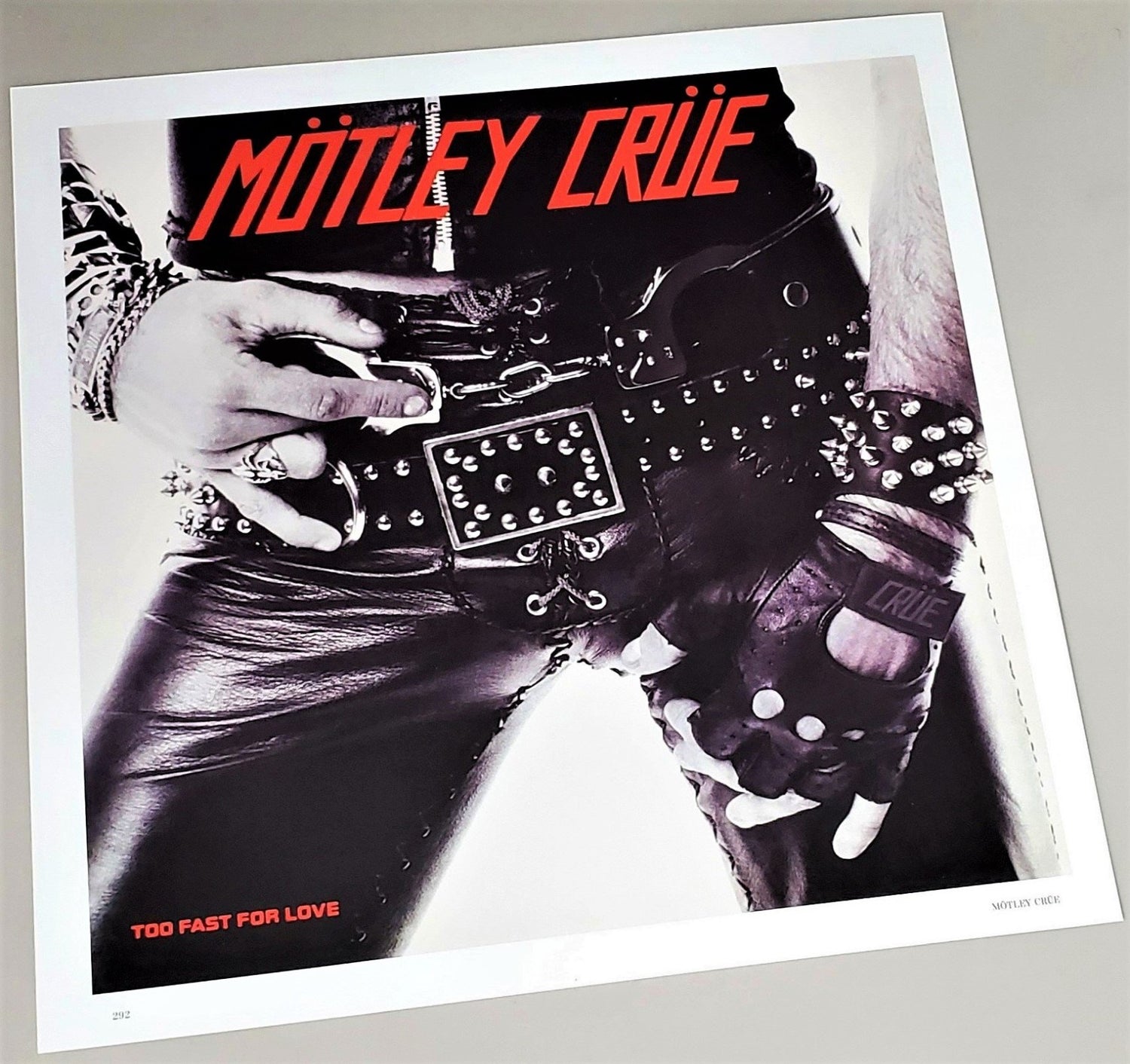 Motley Crue 1982 Too Fast For Love cover art page featured in Rock Covers 2014 coffee table book