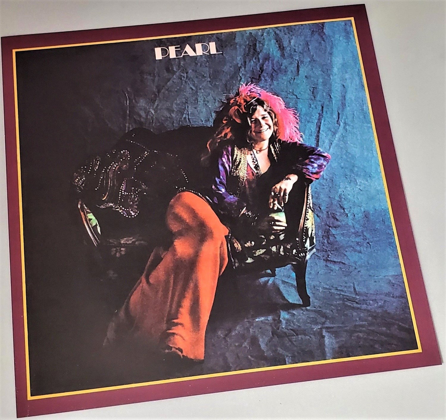 Janis Joplin 1971 Pearl cover art page featured in Rock Covers 2014 coffee table book