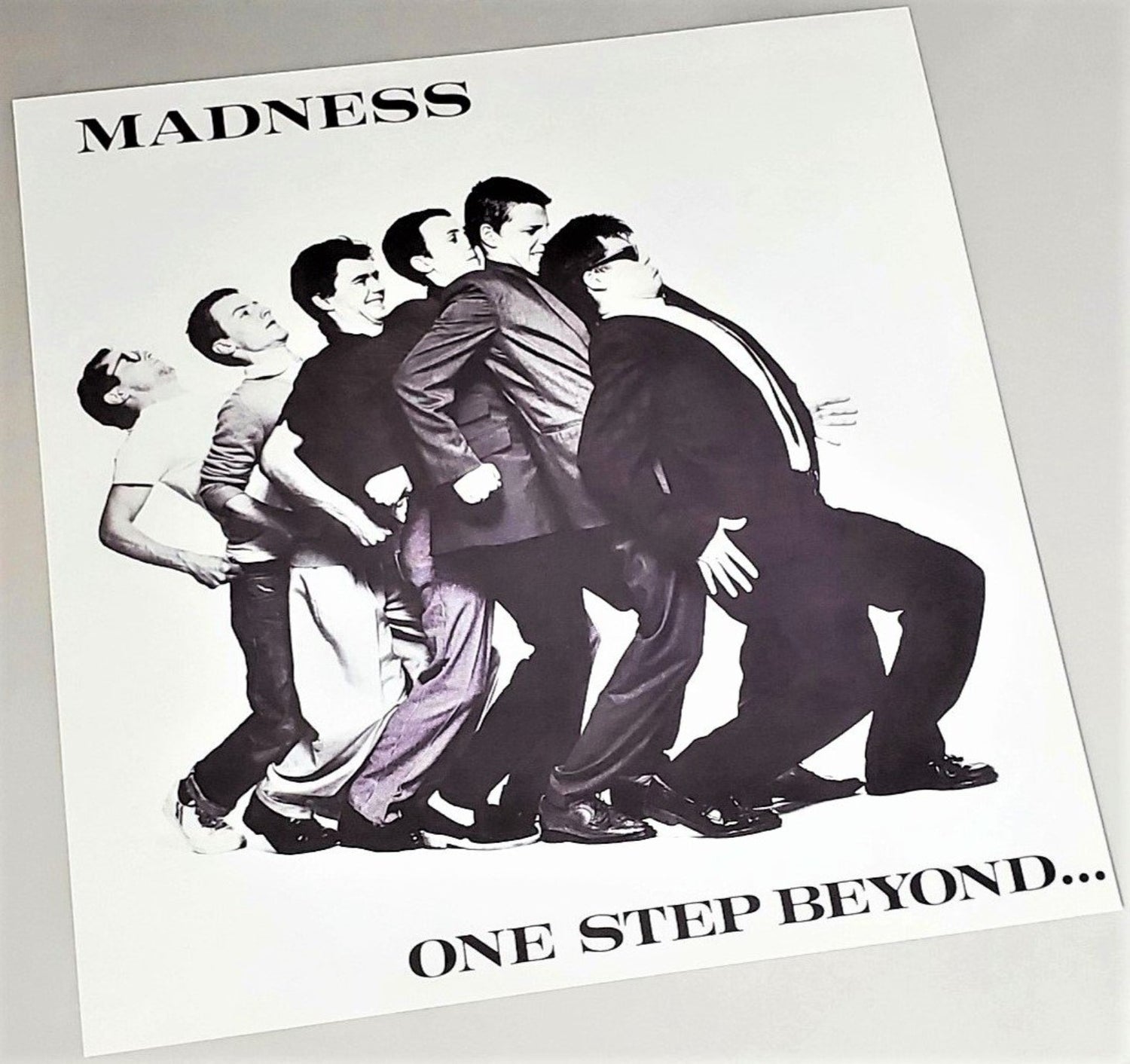 Madness 1979 One Step Beyond album cover art page featured in Rock Covers 2014 coffee table book