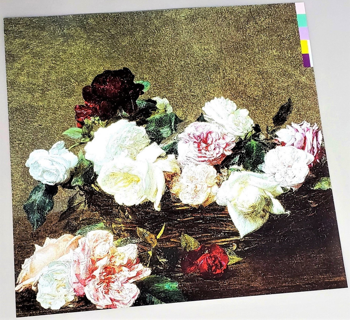 New Order 1983 Power, Corruption & Lies album cover art page featured in Rock Covers 2014 coffee table book