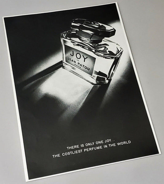 Original 1974 Joy Perfume ad page featured in Playboy magazine